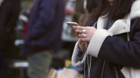 Young-Woman-Using-Smart-Phone