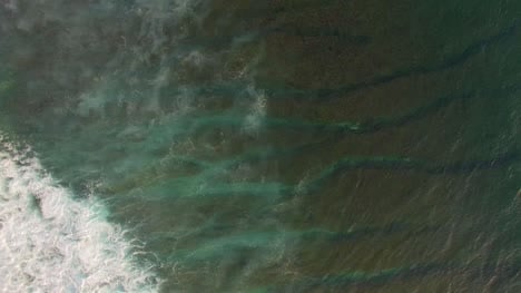 Waves-Breaking-Over-Reef-Aerial-Shot