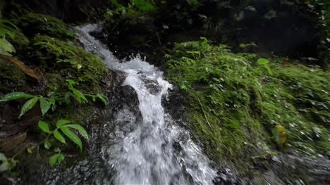 Tracking-Shot-of-a-Small-Waterfall