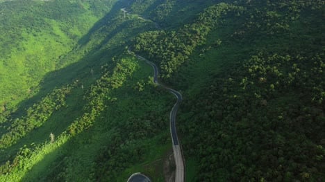 Road-Winding-Through-Forested-Hills