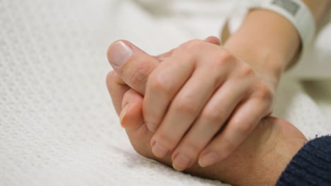 CU-Patient-and-Visitor-Holding-Hands